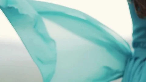 The wind breaks the blue dress Stock Footage 78536933