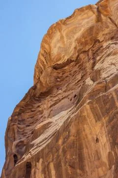 Wind carved rocks in the upper part of the Siq Stock Photos