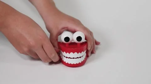 Wind-Up Chattering Teeth Toy Stock Footage 293550619