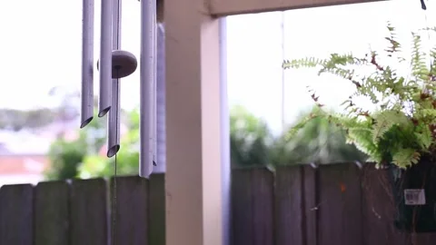 Wind chime attached to the eaves Video stock 293956831