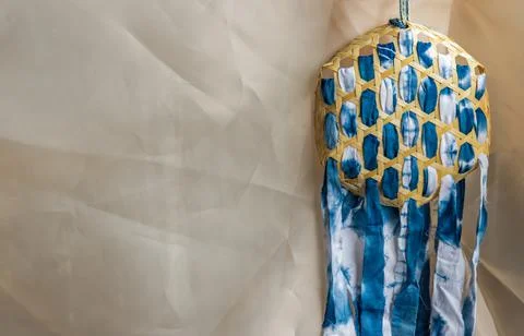 Wind chime Made from Pattern of blue tie batik dye in Basket weave. Stock Photos