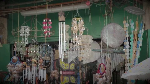 Wind chimes mobile flea market Stock Footage 98676592
