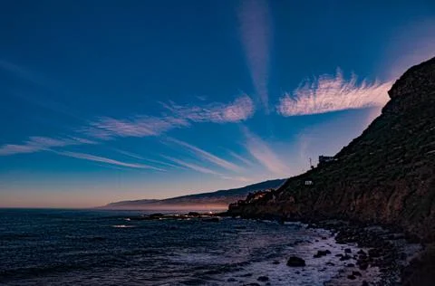 Wind clouds over the calm coast of Tenerife Foto stock