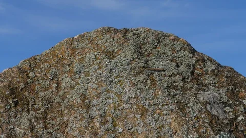 The wind covers the stone by straw 3 Stock-Footage 130135923