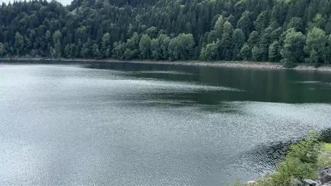 Wind creating ripples on the surface of Šance Reservoir. Stock Footage 345084038