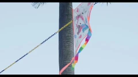 Wind-Driven Kite on Chain with Moving Leaves for Mindfulness Background Use Stock Footage 328092551