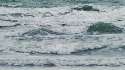Wind Driven Surf and White Foam Pattern on Coastal Sea Surface 動画素材 337612708