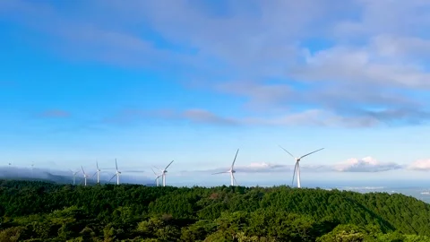 Wind Farm Across Mountain Ridge Under Blue Sky, Japan Stock Footage 339008716