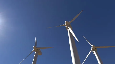Wind farm against the sky, an animation on the theme of renewable electricity Stock Footage 201001868