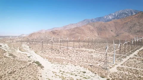 Wind Farm Along Rocky Mountain Base Near Palm Springs, 4K Stock Footage 197018032