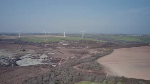 Wind Farm and fields from a drone, Cornwall, England Stock Footage 172557367