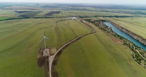 Wind farm and pond Stock Footage 133228008