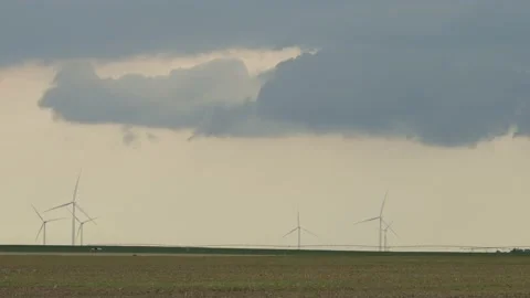 Wind Farm Below Storm Clouds Panning Time Lapse Stock Footage 233114578