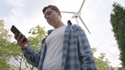 Wind farm designer creating projects for the installation of wind turbines in sp Stock Footage 300250716