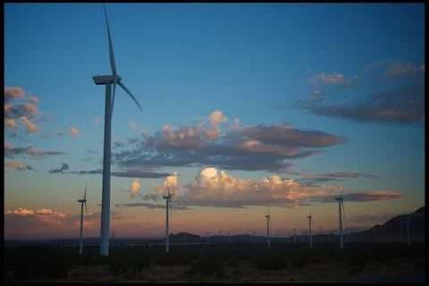 Wind farm with dramatic clouds Stock Photos