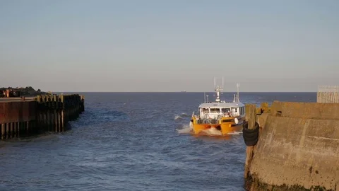 Wind Farm Fast Support Vessels returning to harbour, Lowestoft, Suffolk, England Stock Footage 80270761