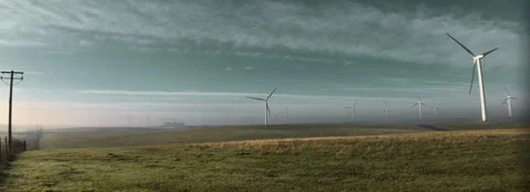 Wind farm on a hazy day Stock Footage 261473584