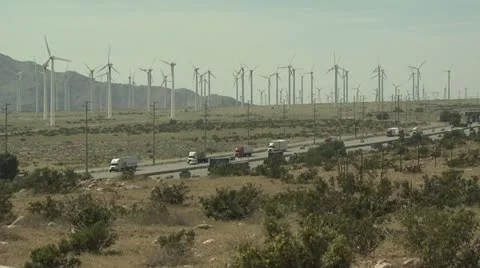 Wind Farm with Highway in the Foreground 스톡 동영상 19170025