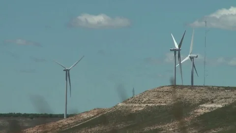 Wind farm left to right pan shot Stock Footage 73896564