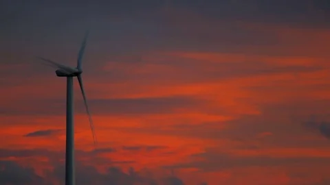 Wind Farm Lone Propeller at Sunset against colored sky Stock Footage 81150874