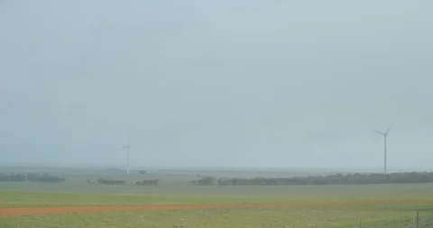 Wind farm with low cloud passing through Stock Footage 115039536