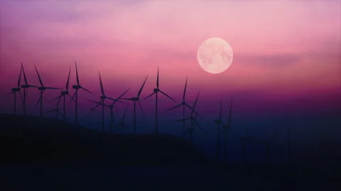 Wind farm with many rotating wind turbines with a big moon on a spectacular pink Stock Footage 277888641