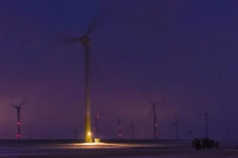 Wind farm in the night Stock Photos