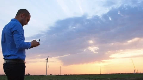 A wind farm operator  Stockbeeldmateriaal 130660196