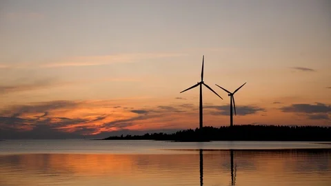 Wind farm, silhouettes of two wind turbines spinning Stock-Footage 117352227