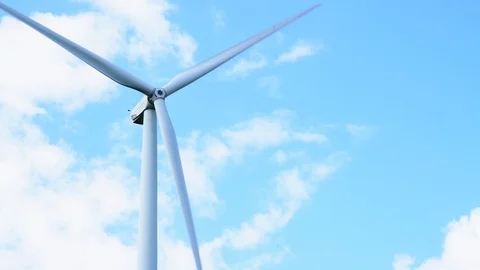 Wind farm, single wind turbine detail long shot spinning in the wind Stock-Footage 117352522