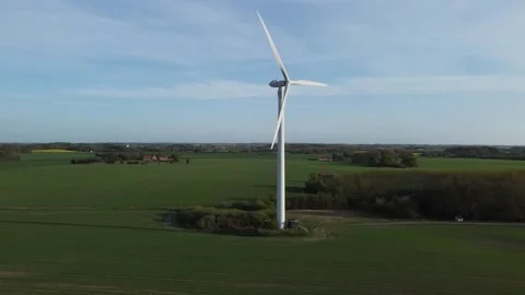 A wind farm stands in a field, summer clear weather Stock Footage 194692907