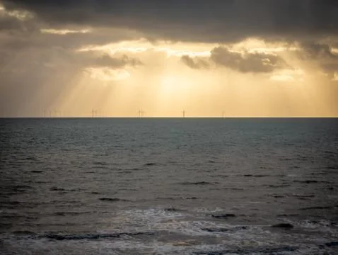 Wind farm in sunlight Stock Photos