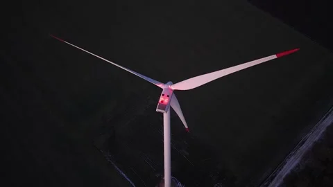 Wind farm at sunrise or sunset. Aerial night view of Windpark with wind turbines Stock Footage 340565979