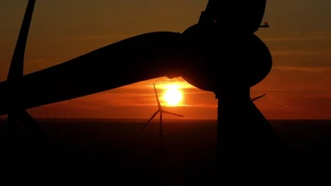 Wind farm at sunrise, wind generators aerial view, windmills generating Stock-Footage 308481672