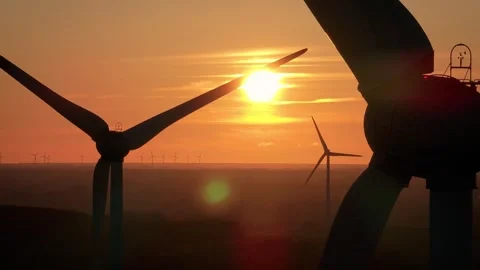 Wind farm at sunrise, wind generators aerial view, windmills generating Stock-Footage 308481698
