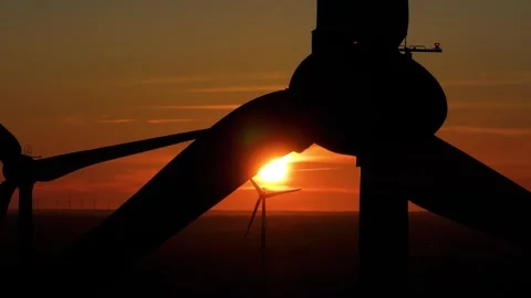 Wind farm at sunrise, wind generators aerial view, windmills generating Stock-Footage 308481703
