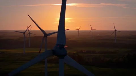 Wind farm at sunrise, wind generators aerial view, windmills generating Stock-Footage 308481863