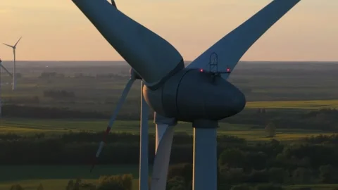 Wind farm at sunrise, wind generators aerial view, windmills generating Stock-Footage 308482030