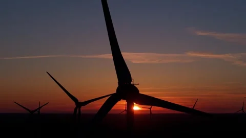 Wind farm at sunrise, wind generators aerial view, windmills generating Stock-Footage 308482071