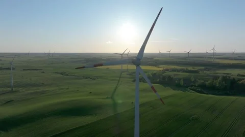 Wind farm at sunrise, wind generators aerial view, windmills generating Stock-Footage 308482083