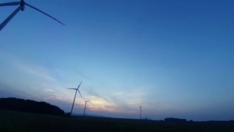 Wind farm at sunset Stock Footage 99054446