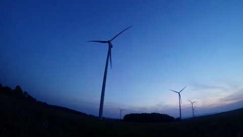 Wind farm at sunset Stock Footage 99056303