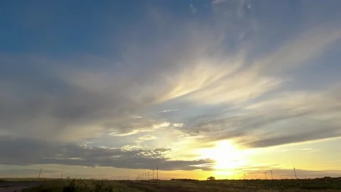 Wind farm with windmills turning gently at sunset. Beautiful landscape with.. Stock Footage 252397784