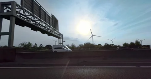Wind farms along the highway Stock Footage 244355991