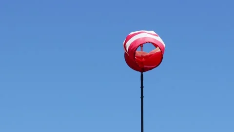 A wind flag in the wind Stockbeeldmateriaal 153019329
