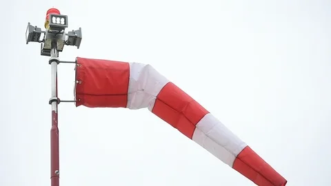 A wind gauge, or anemometer, shot against outcast sky in a windy day Video stock 120777918