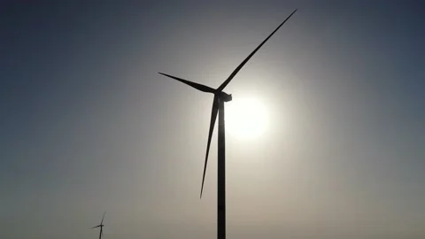 Wind generator and blades on the background of the sun Stock Footage 132201989