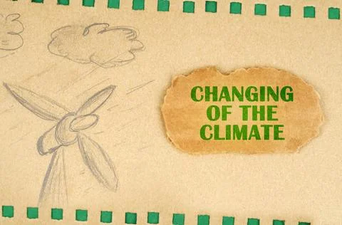A wind generator and clouds are drawn on cardboard, next to it lies a cardb.. Stock Illustration