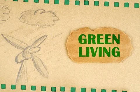 A wind generator and clouds are drawn on cardboard, next to it lies a cardb.. Stock Photos