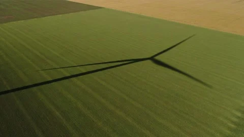 Wind generator and its shadow on a field with wheat part #06 Stock Footage 132201041